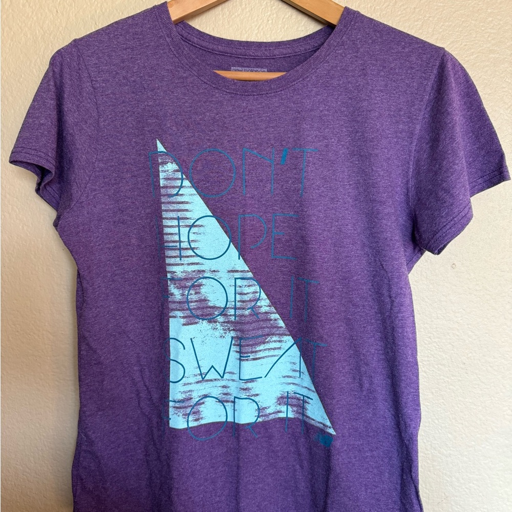 New Balance Women’s Purple Graphic Tee – “Don’t Hope, Sweat For It”